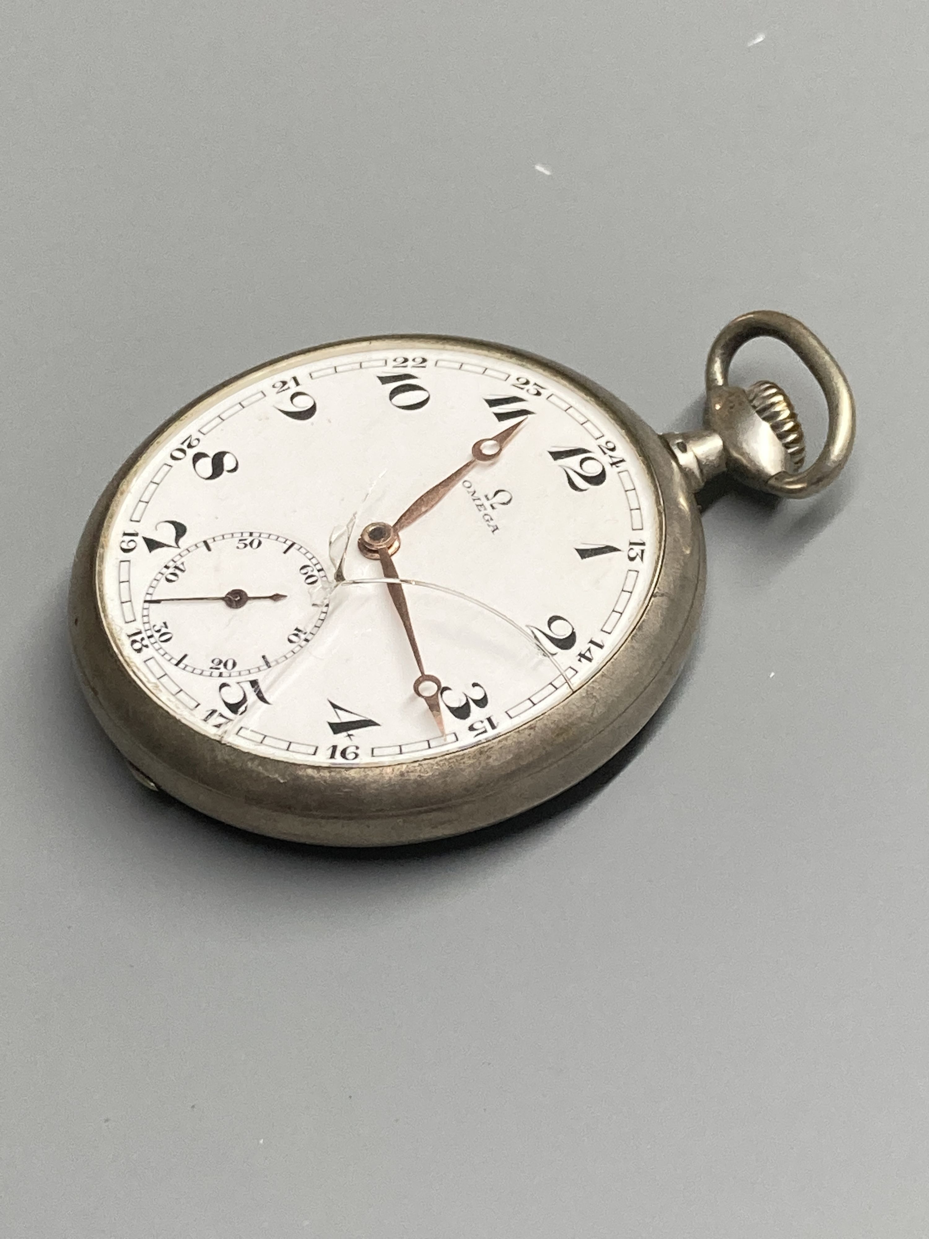 An early 20th century engine turned 800 standard Omega open face keyless pocket watch (glass a.f.)